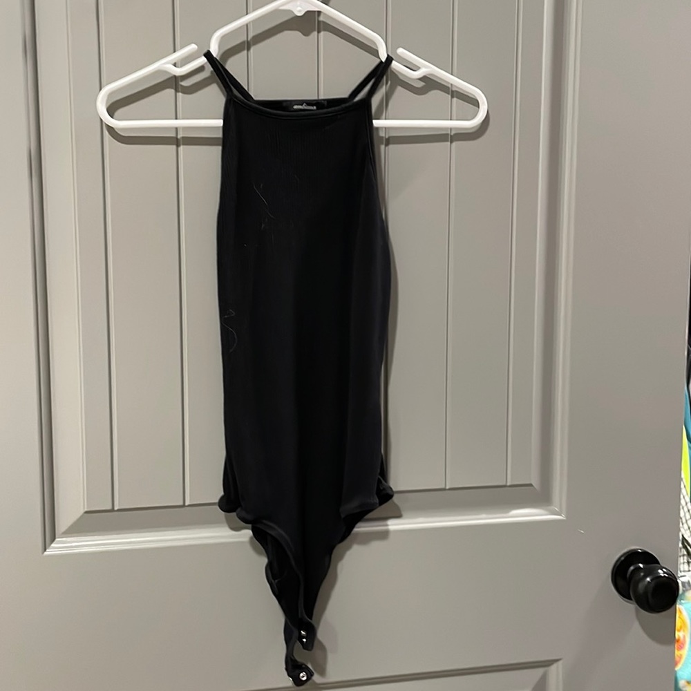 Black rubbed body suit